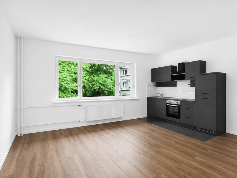 Erstbezug nach Sanierung – gepfl. 2-Zi-Whg, 45 m² mit offener EBK & modernem Tageslichtbad — photo 1